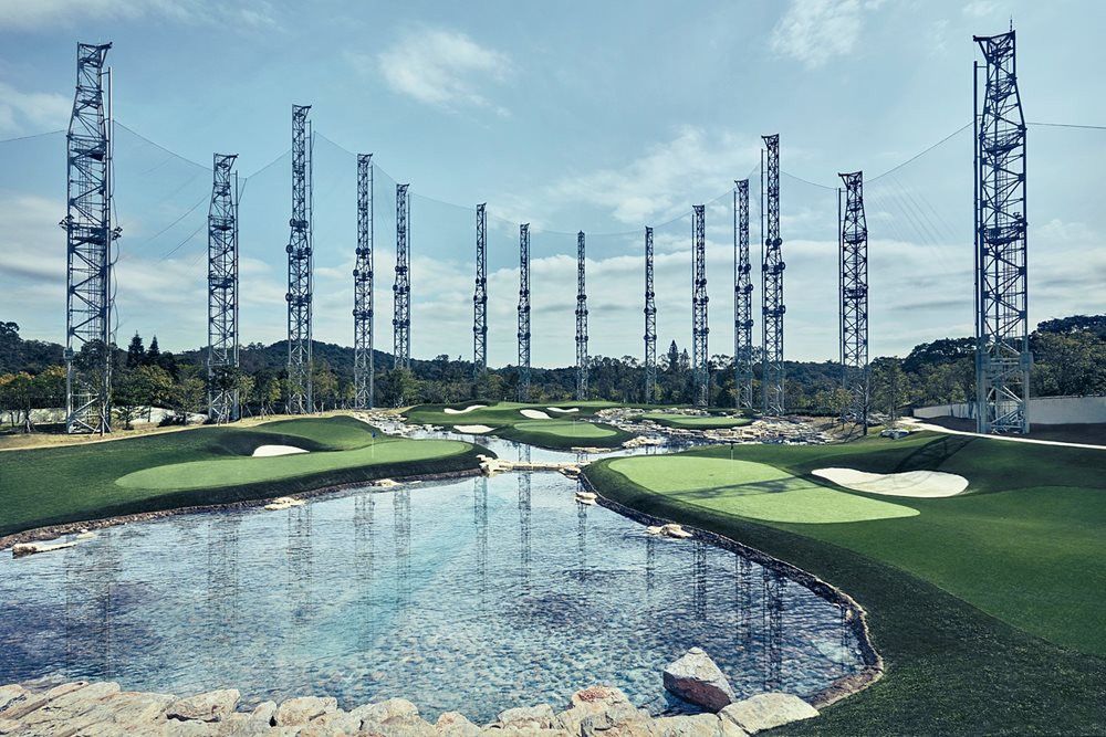 Tucson Synthetic grass golf course with water and tall metal towers