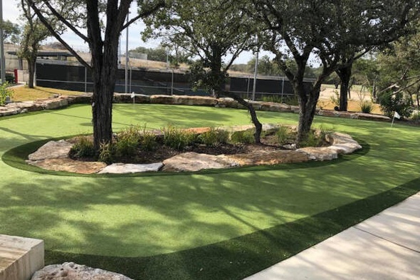 Tucson residential backyard putting green grass